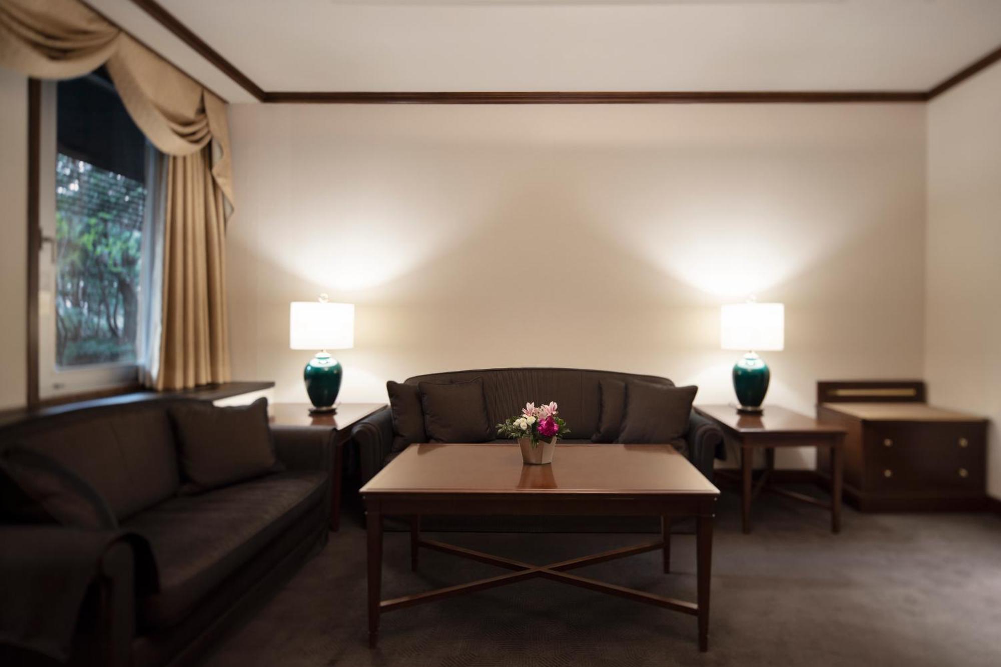 Sapporo Grand Hotel Room photo A living room at the hotel