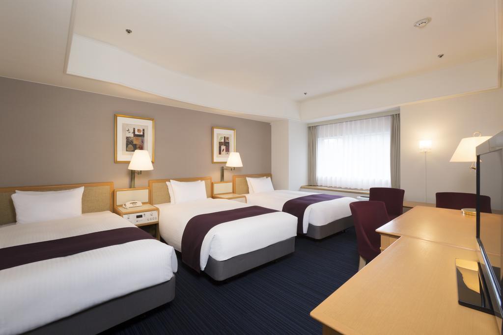 Sapporo Grand Hotel Exterior photo A typical room at the hotel